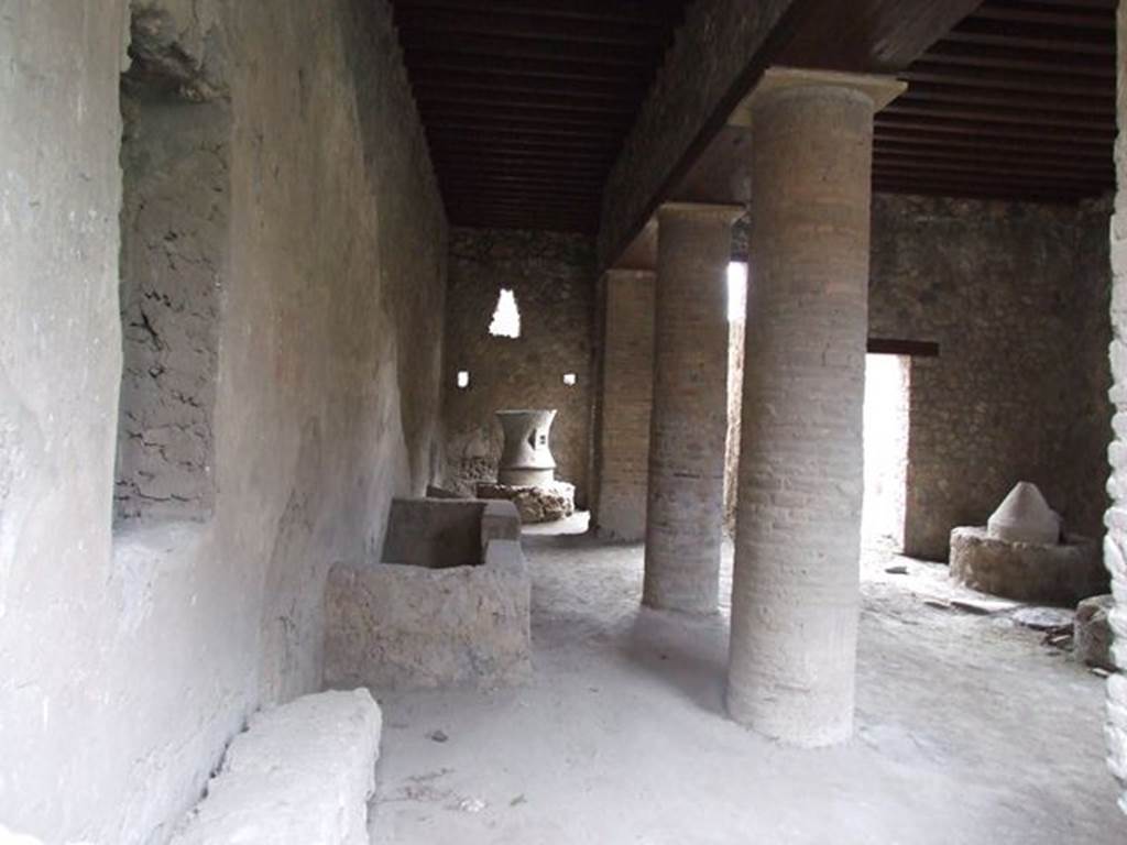 I.12.1 and I.12.2 Pompeii. December 2006. Room with mills.