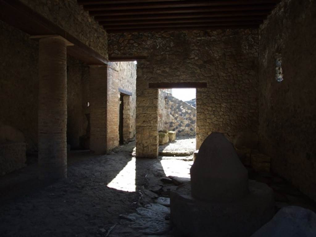 I.12.2 and I.12.1 Pompeii. March 2009. Room 3, room with mills. Looking south.