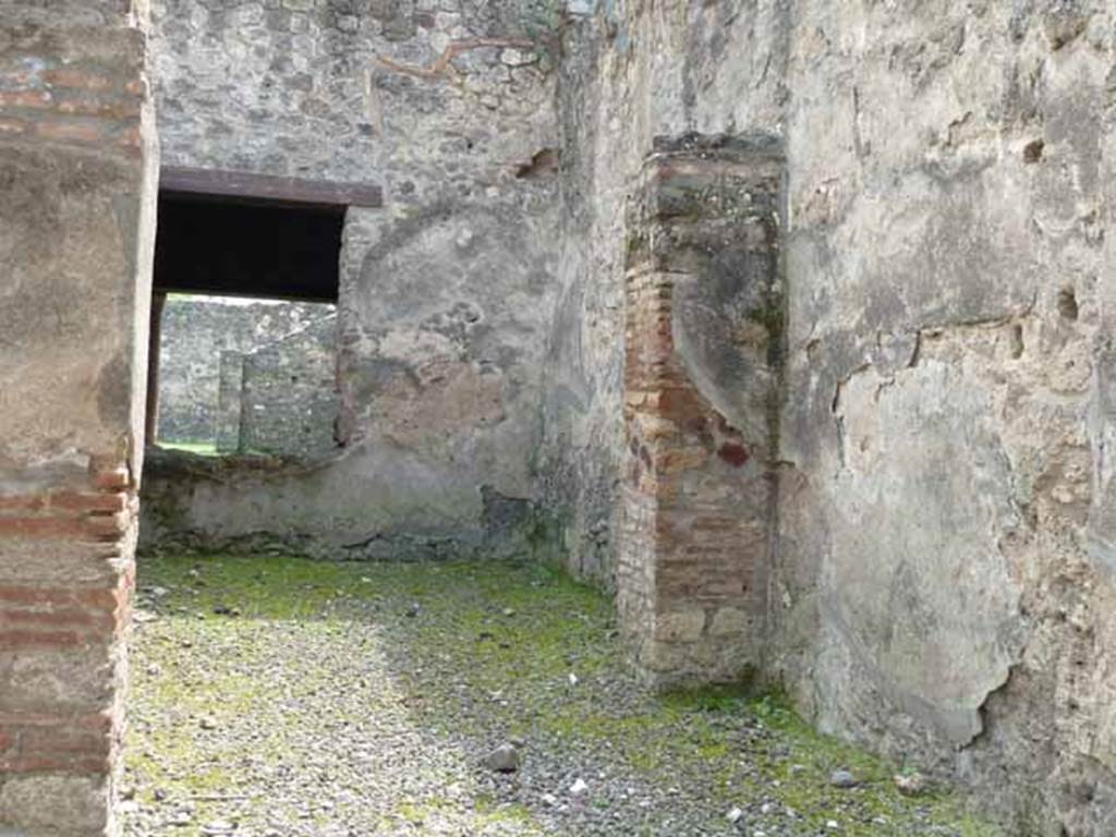 I.12.1 and I.12.2 Pompeii. Room 2, south wall with window, south-west corner and west wall.