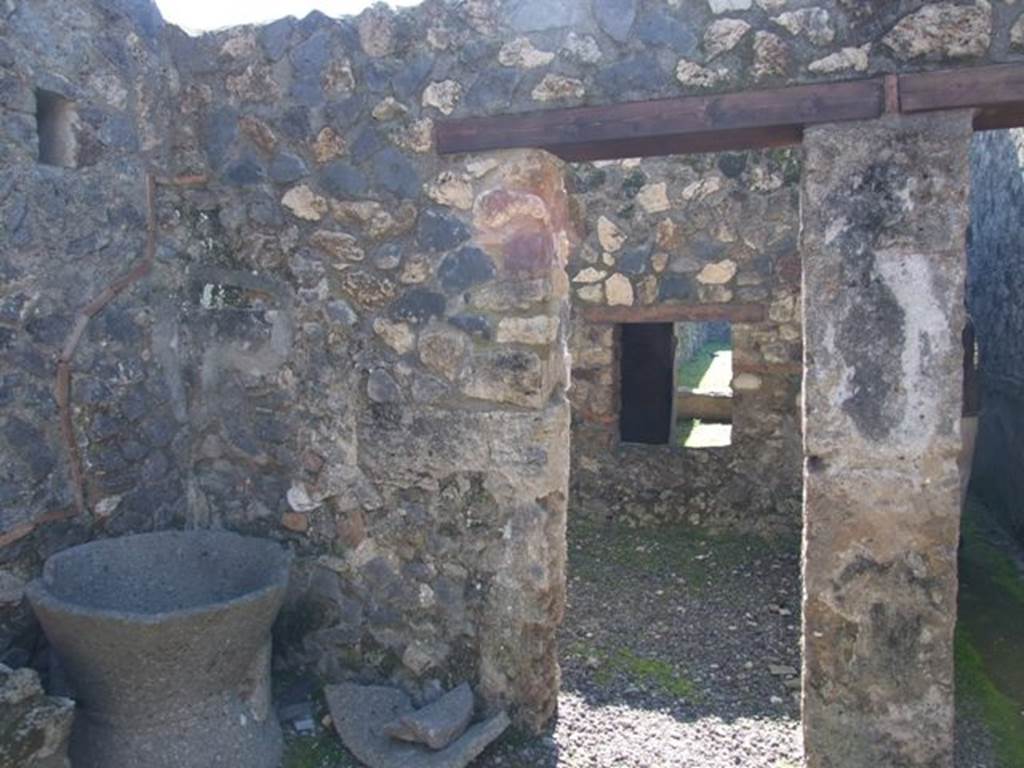 I.12.2 and I.12.1 Pompeii. March 2009 Room 4. Doorway into room 5.