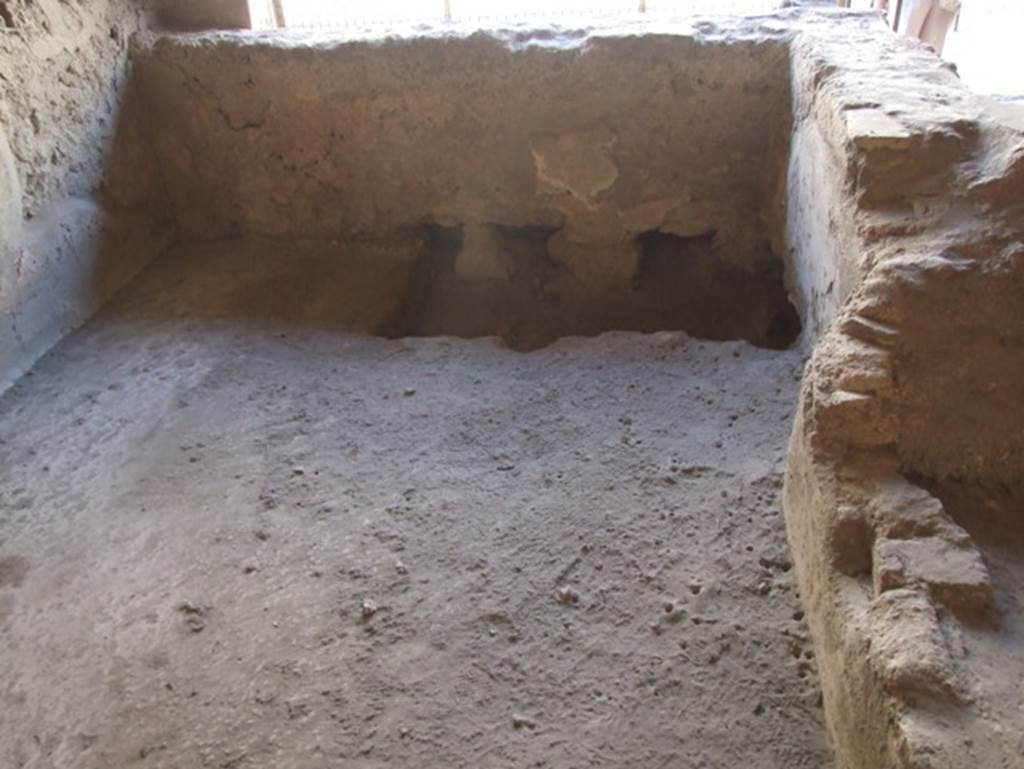 I.12.3 Pompeii. March 2009. Room 1. Caupona. Looking north at rear of counter.