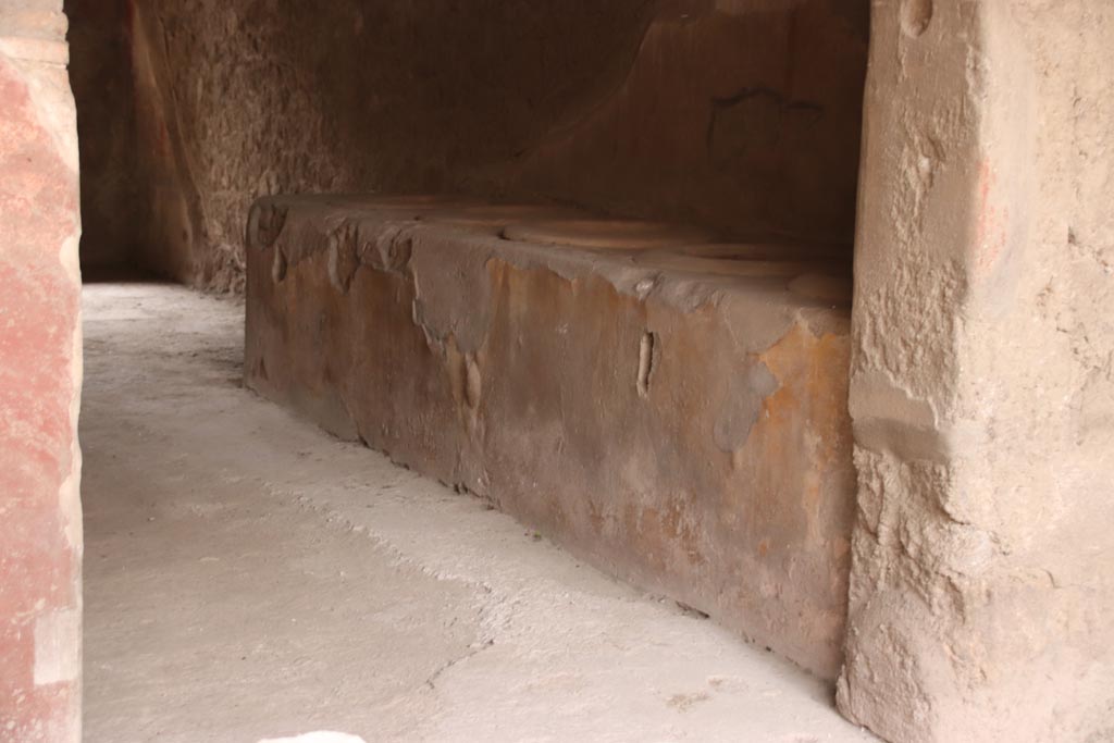 I.12.3 Pompeii, May 2024. Room 1, counter leaning against west wall of courtyard. Photo courtesy of Klaus Heese.