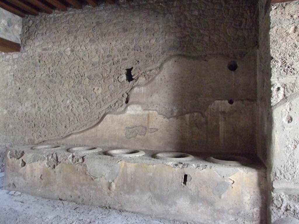 I.12.3 Pompeii. March 2009. Room 1. Caupona courtyard. West wall.