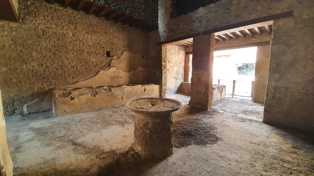 I.12.3 Pompeii. July 2021. Looking north-west across courtyard towards bar-room and entrance, from outside room 2.
Foto Annette Haug, ERC Grant 681269 DÉCOR