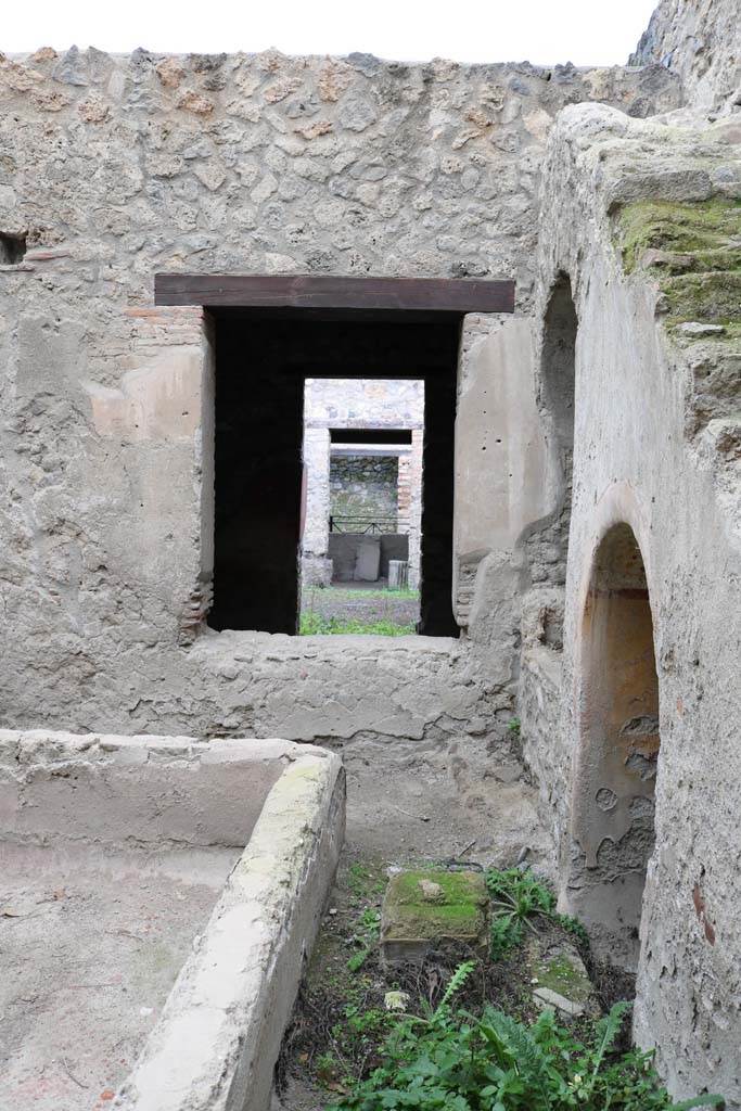 I.12.5 Pompeii. December 2018.
Looking north from courtyard/garden towards window into triclinium, across atrium to doorway to caupona.
Photo courtesy of Aude Durand.