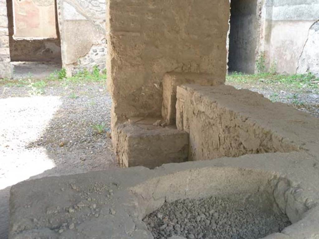 I.12.5 Pompeii. September 2015. Looking south along counter, towards hearth at far end.
