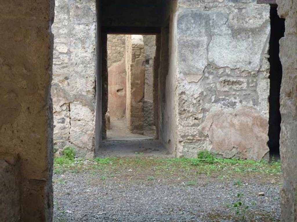 I.12.5 Pompeii. September 2015. Looking south across atrium to corridor leading to garden.