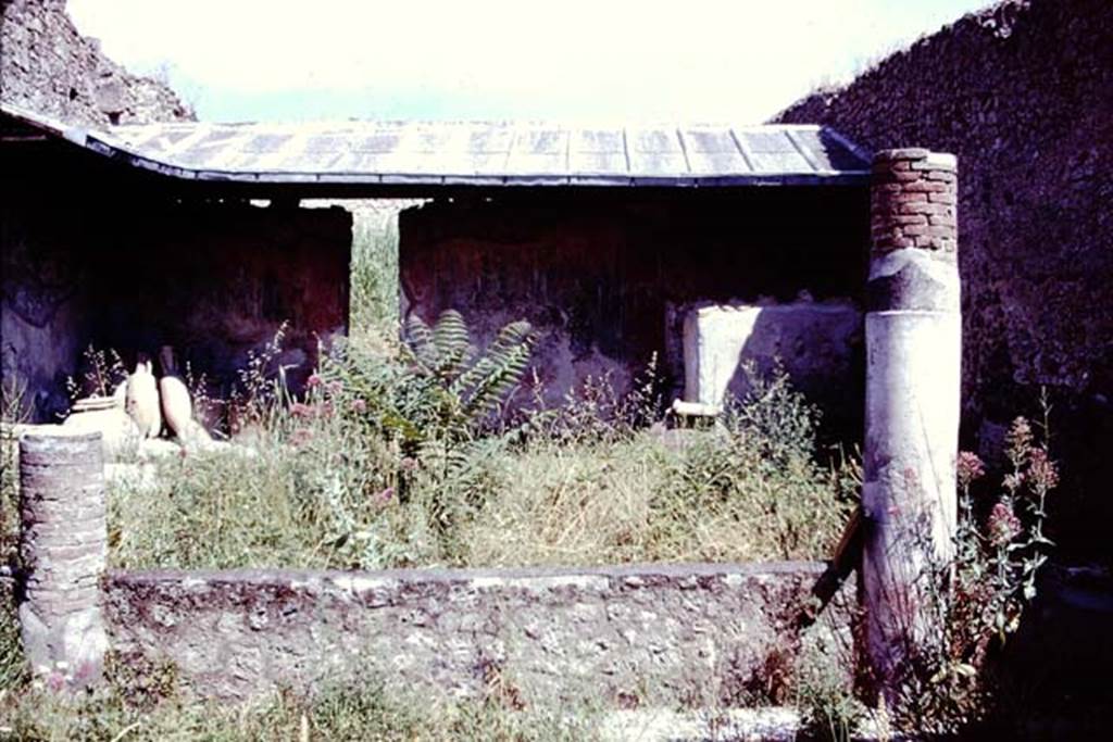 I.12.8 Pompeii, 1978. Looking north across peristyle from south portico with remains of two columns. Photo by Stanley A. Jashemski.
Source: The Wilhelmina and Stanley A. Jashemski archive in the University of Maryland Library, Special Collections (See collection page) and made available under the Creative Commons Attribution-Non Commercial License v.4. See Licence and use details.
J78f0207