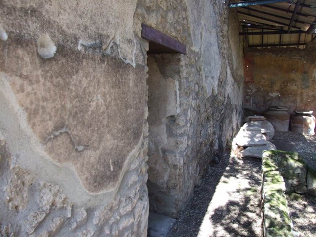 I.12.8 Pompeii. March 2009. Room 9. Looking north along west portico, and doorway to room 11.