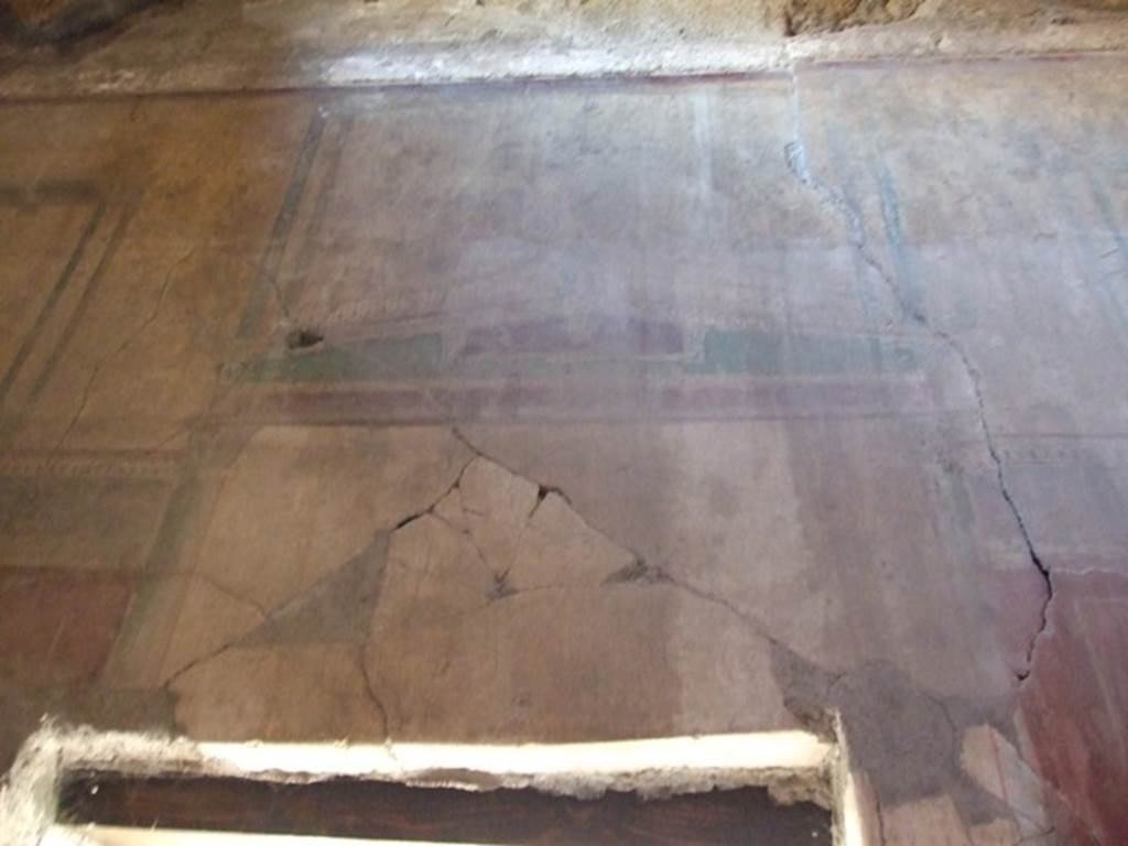 I.12.8 Pompeii. March 2009. Room 11. East wall above door.