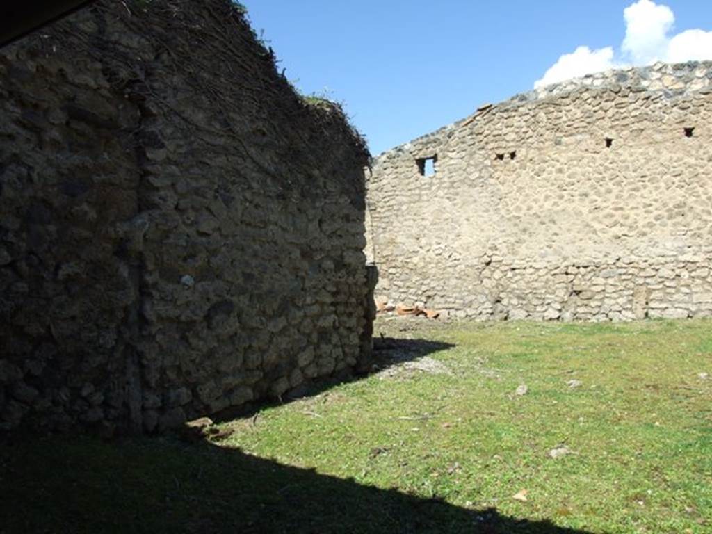 I.12.8 Pompeii. March 2009. Room 13, looking north-west across the rear garden, from south-west corner.