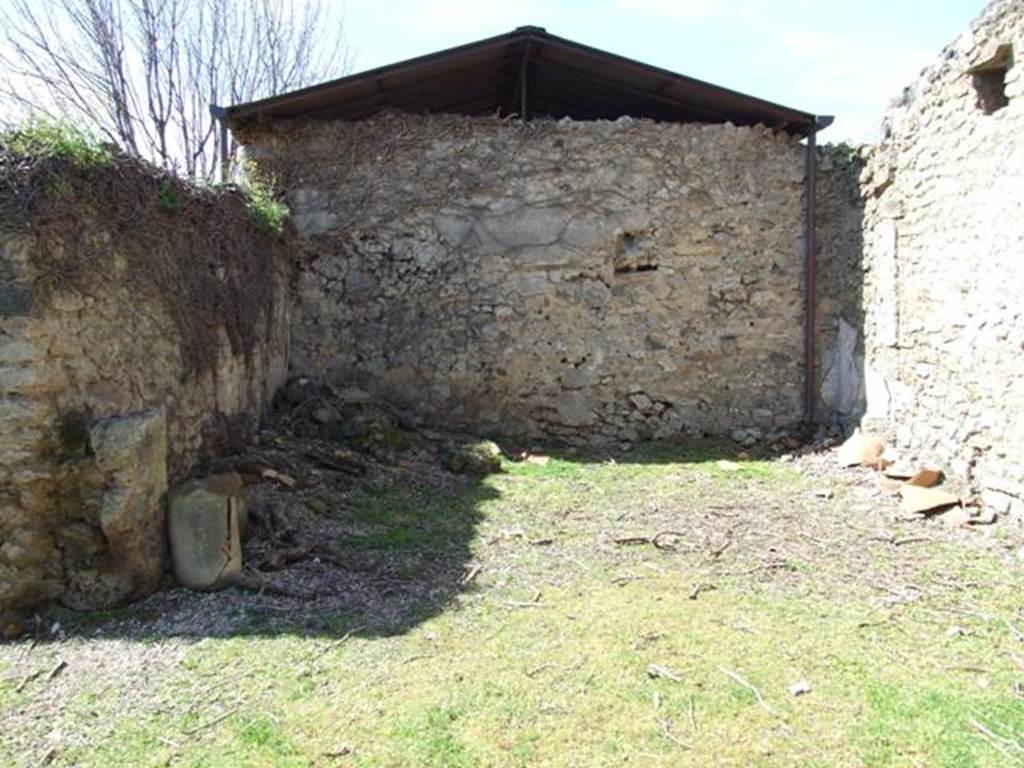 I.12.8 Pompeii. March 2009. Room 13, looking north in rear garden.
According to Curtis, on Eschebach’s 1969 plan of the house is shown an entrance doorway from the rear garden courtyard leading into the house at I.12.7.
This is an error. See Curtis R.L: The Garum shop of Pompeii, In Cronache Pompeiane, V.1979, p.8 note 5.