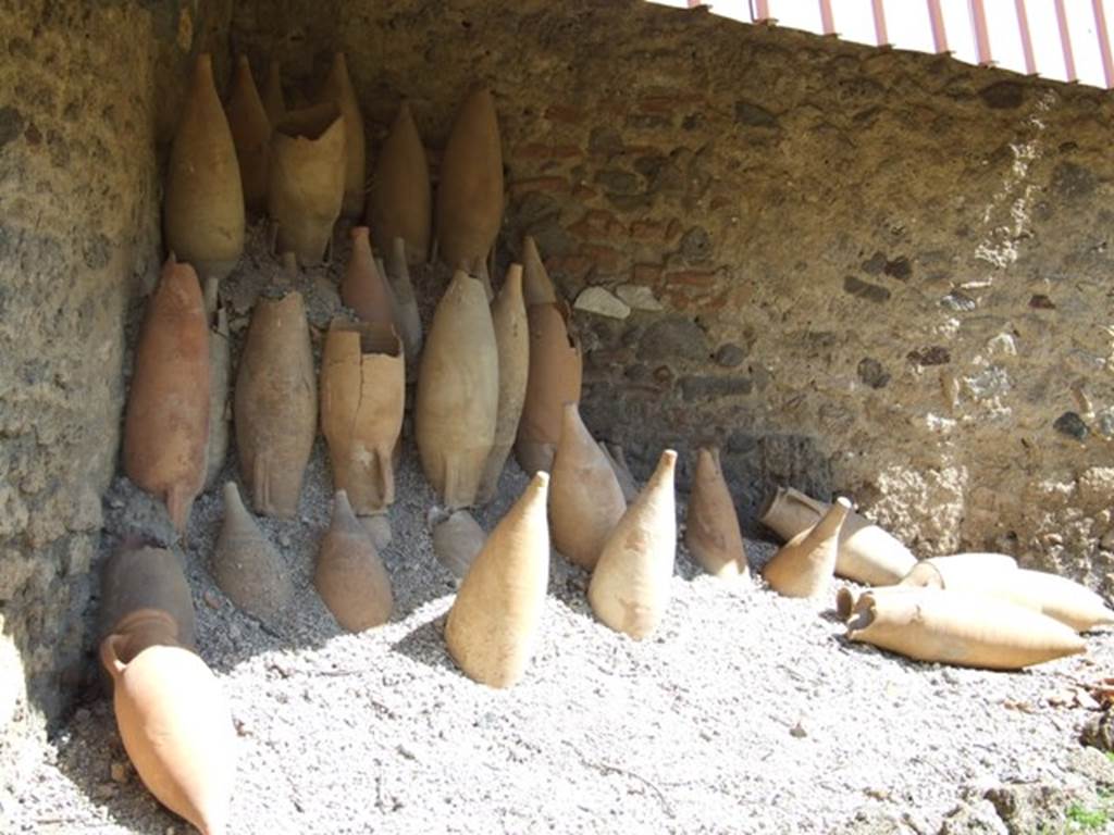 I.12.8 Pompeii. March 2009. Room 13. Rear garden. Remains of excavated amphorae.
