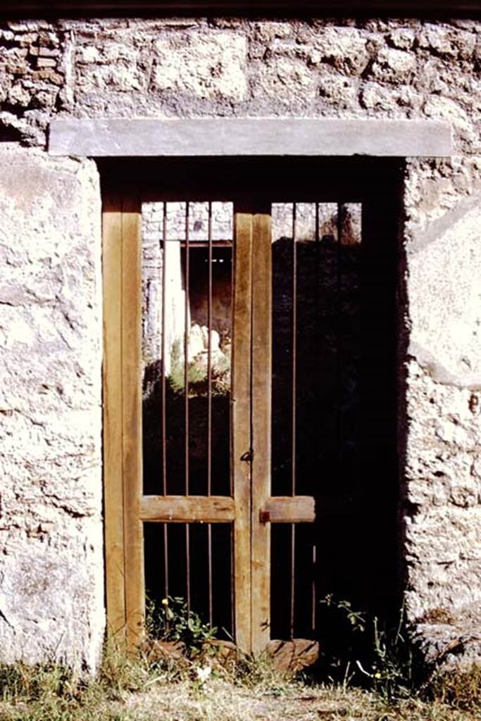 I.12.8 Pompeii. 1972. Looking north through entrance doorway. Photo by Stanley A. Jashemski.
Source: The Wilhelmina and Stanley A. Jashemski archive in the University of Maryland Library, Special Collections (See collection page) and made available under the Creative Commons Attribution-Non Commercial License v.4. See Licence and use details. J72f0603