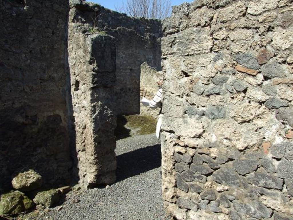 I.12.8 Pompeii. March 2009. Room 1. North wall with door to room 5.