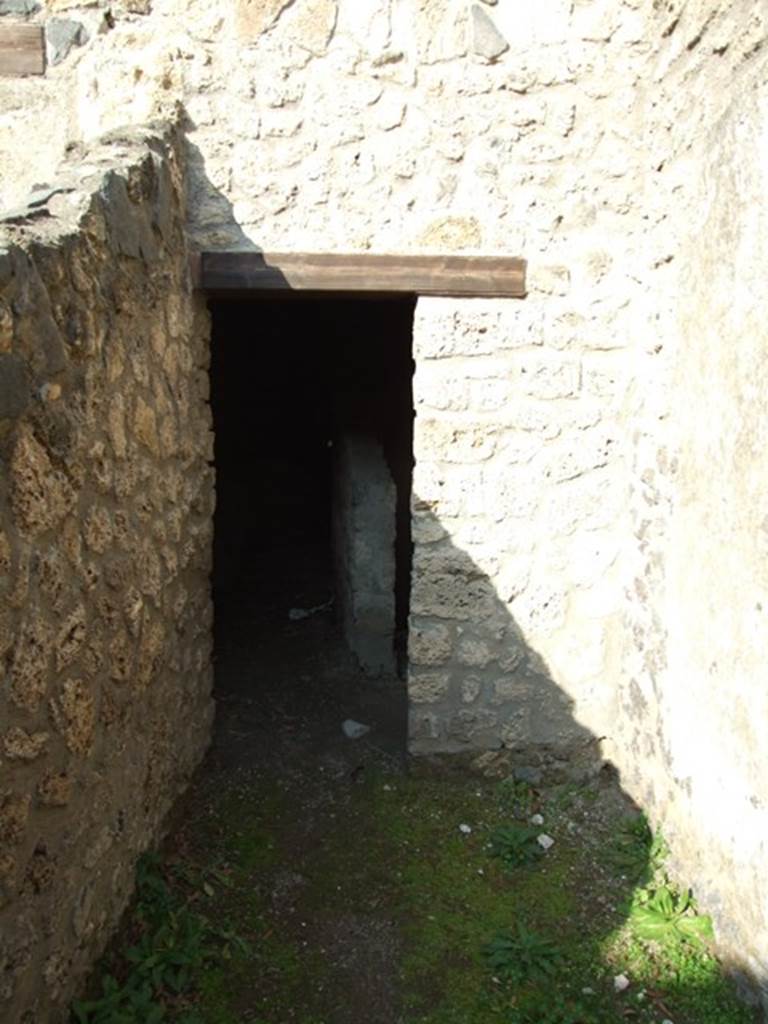 I.12.9 Pompeii. House. December 2007. Looking north on east side of Tablinum towards the kitchen.