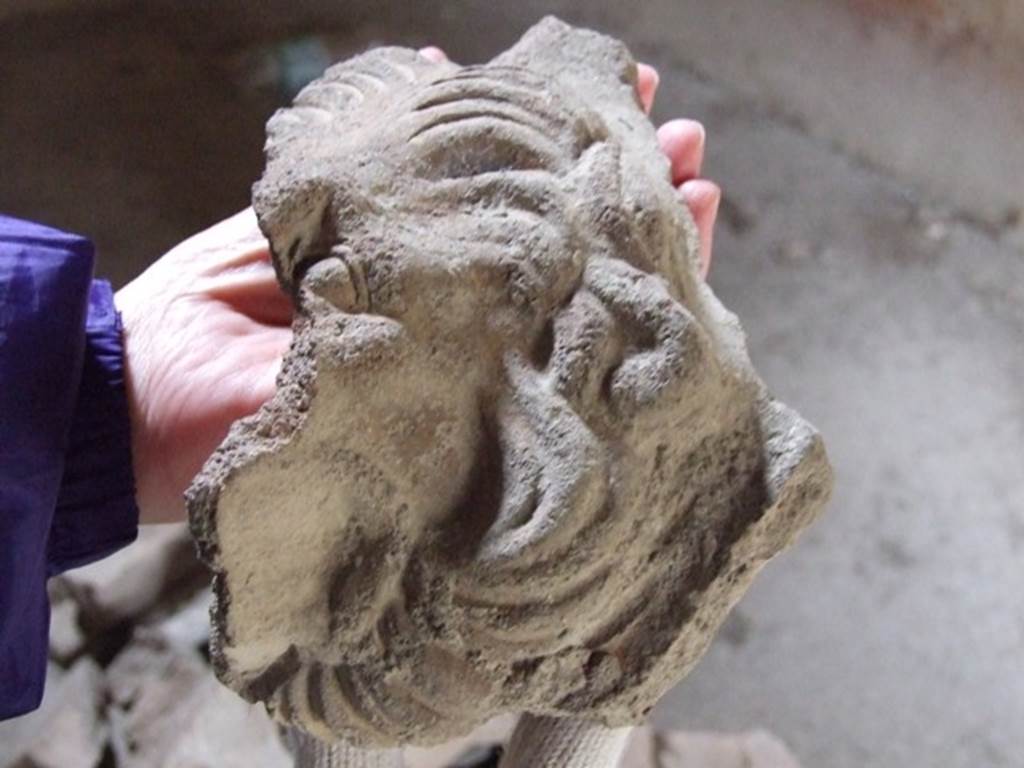 I.12.11 Pompeii. December 2007. Remains of a lions face on a grondaia, or water-spout.