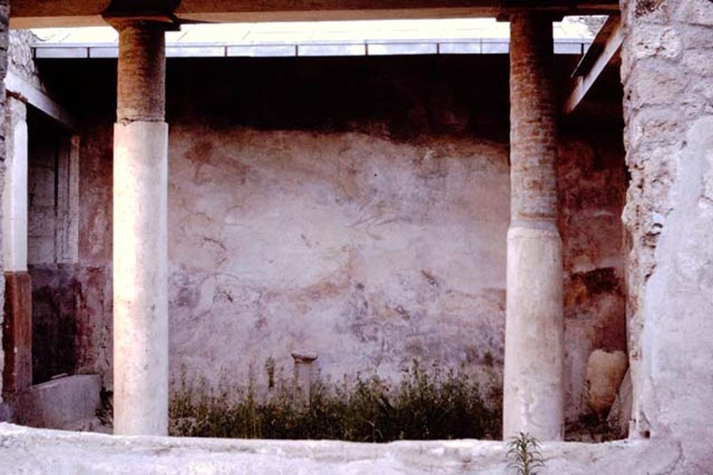 I.12.11 Pompeii. 1964. Looking towards north wall of garden with hunt scene, from the atrium. Photo by Stanley A. Jashemski.
Source: The Wilhelmina and Stanley A. Jashemski archive in the University of Maryland Library, Special Collections (See collection page) and made available under the Creative Commons Attribution-Non Commercial License v.4. See Licence and use details.
J64f1919