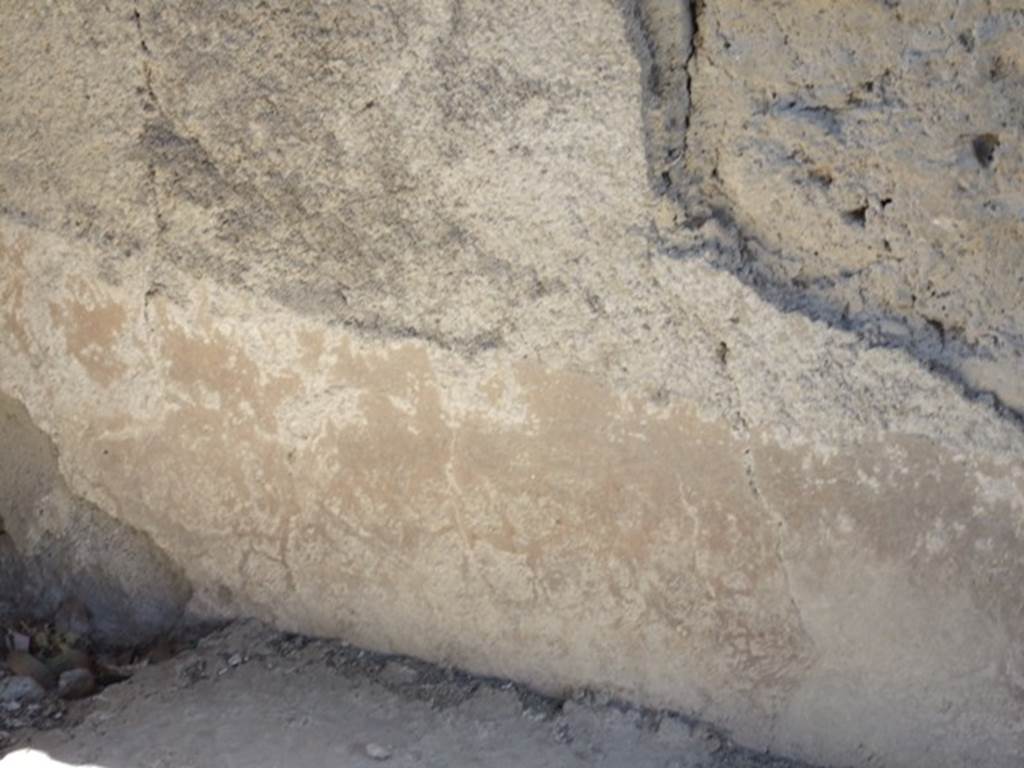 I.12.15 Pompeii. March 2009. Room 5. South west corner, detail of remains of wall plaster.