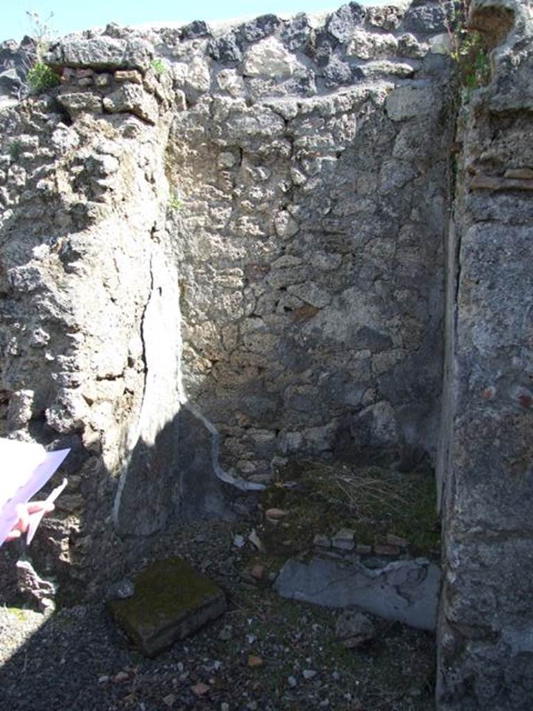 I.12.15 Pompeii. March 2009. East wall outside room 6.