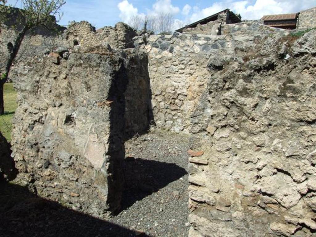 I.12.15 Pompeii. March 2009. Doorway to room 7 in north wall of room 5.