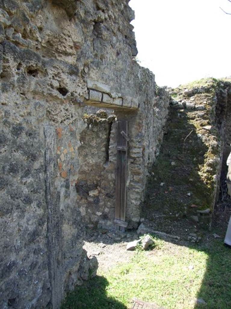I.12.15 Pompeii. March 2009. Staircase looking west, and doorway from garden to atrium.