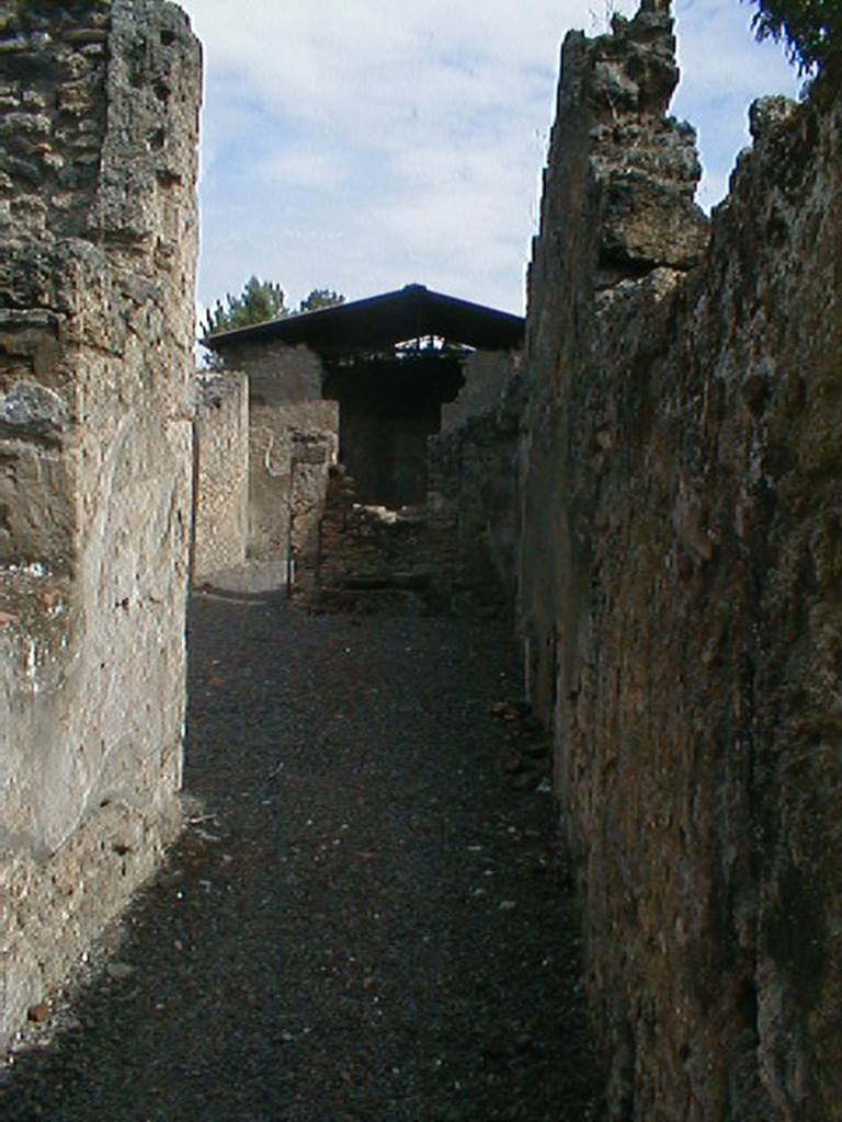 I.12.15 Pompeii. September 2004. Corridor leading to atrium.