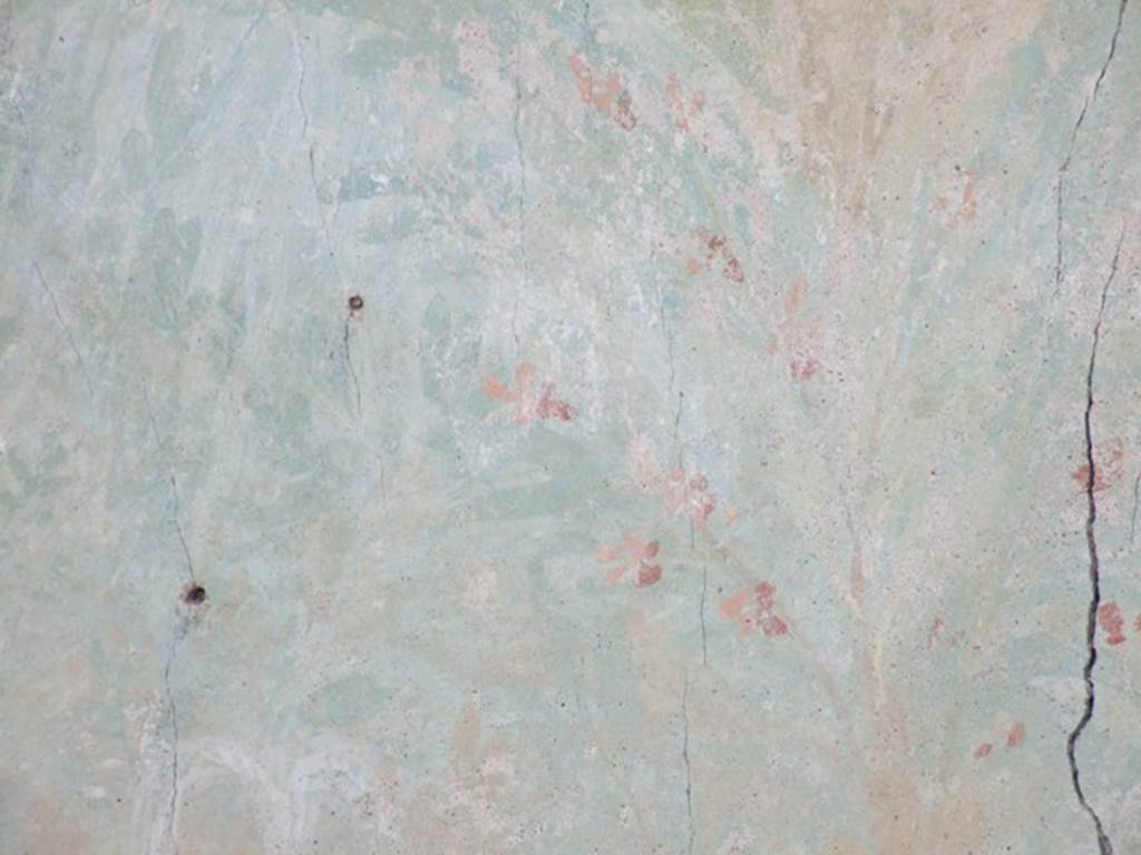 I.12.16 Pompeii. March 2009. Room 4. East wall. Garden painting. Detail of flowers above the fountain.