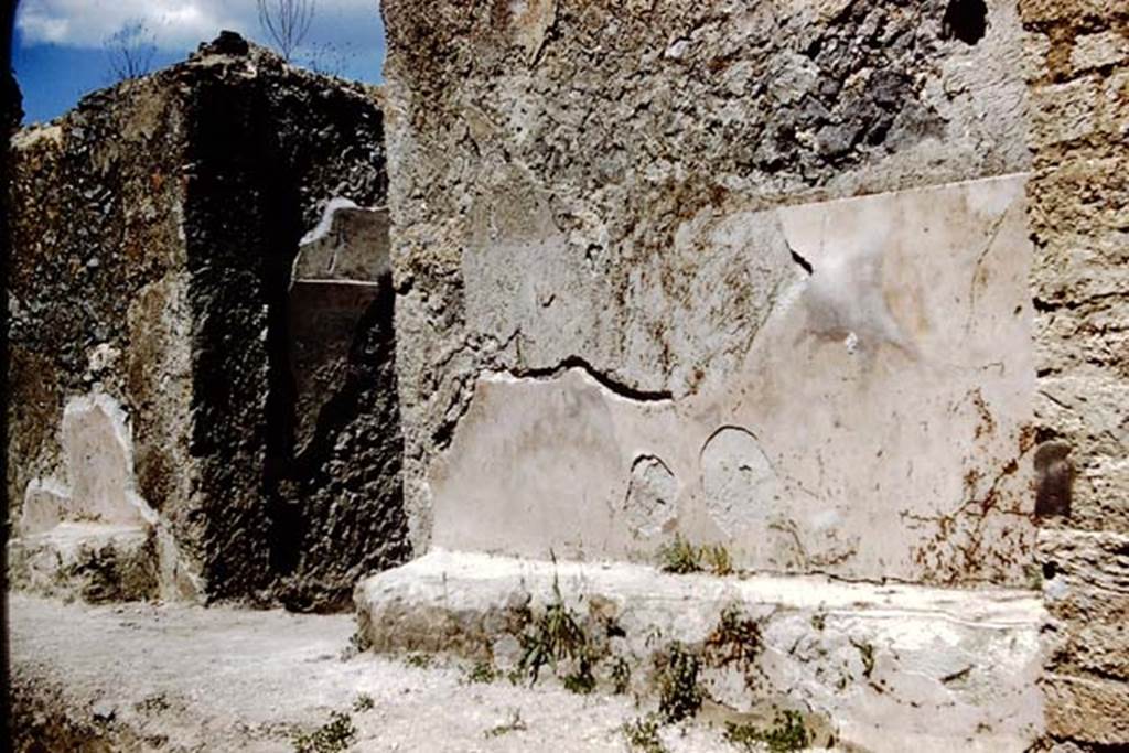 I.12.16 Pompeii. 1961. Plastered painted wall and benches on either side of entrance doorway. Photo by Stanley A. Jashemski.
Source: The Wilhelmina and Stanley A. Jashemski archive in the University of Maryland Library, Special Collections (See collection page) and made available under the Creative Commons Attribution-Non Commercial License v.4. See Licence and use details.
J61f0320