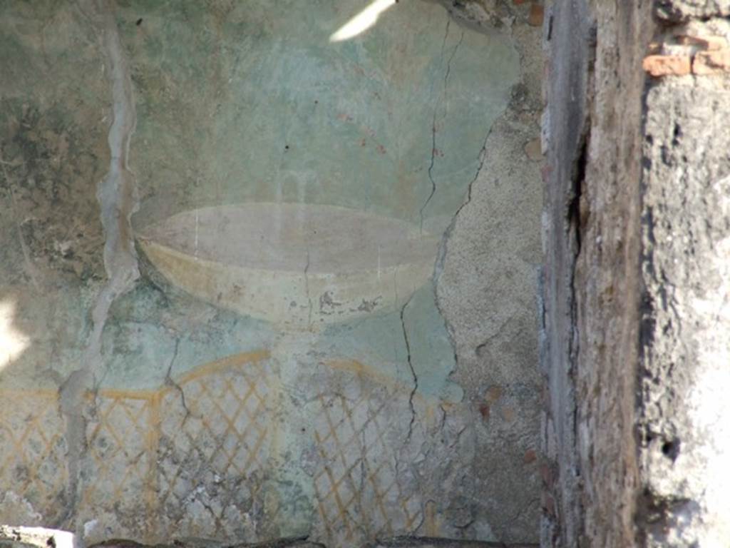 I.12.16 Pompeii. December 2007. Garden painting visible from the entrance. Wall painting of a garden fountain in a bowl or labrum with trellis underneath.