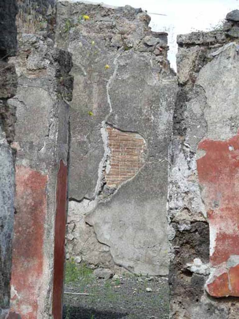 I.12.16 Pompeii. May 2010. Room 3, looking through doorway towards east wall.