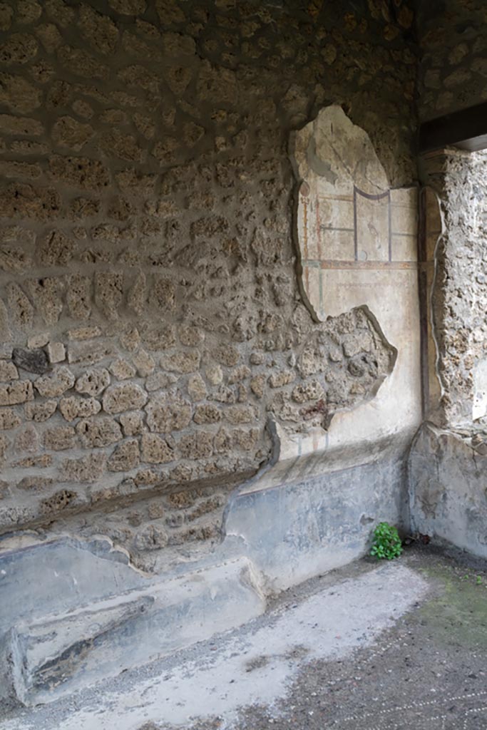 I.13.2 Pompeii. March 2023.
West wall of triclinium at north end. Photo courtesy of Johannes Eber.