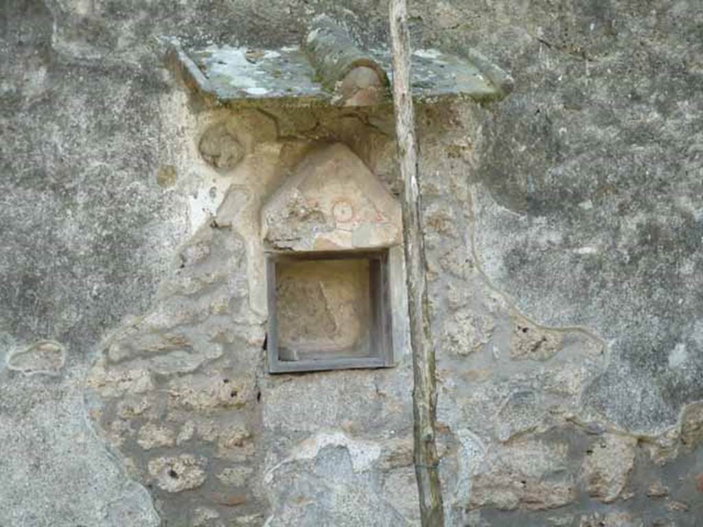 I.13.2 Pompeii. May 2010. Aedicula lararium on south wall of garden.