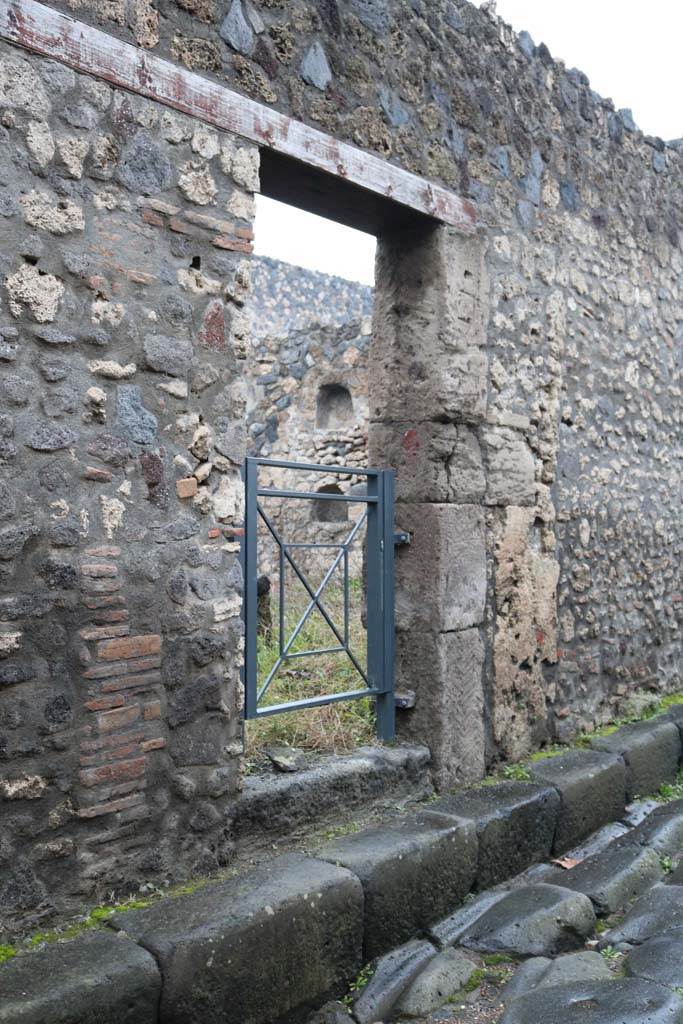 I.13.6 Pompeii. December 2018.
Entrance doorway on west side of Via di Nocera. Photo courtesy of Aude Durand.