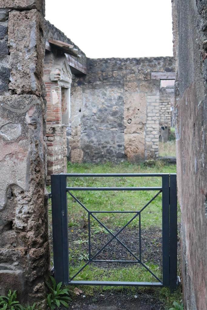 I.13.13 Pompeii. December 2018.
Doorway in east end of north wall into atrium of I.13.12. Photo courtesy of Aude Durand.