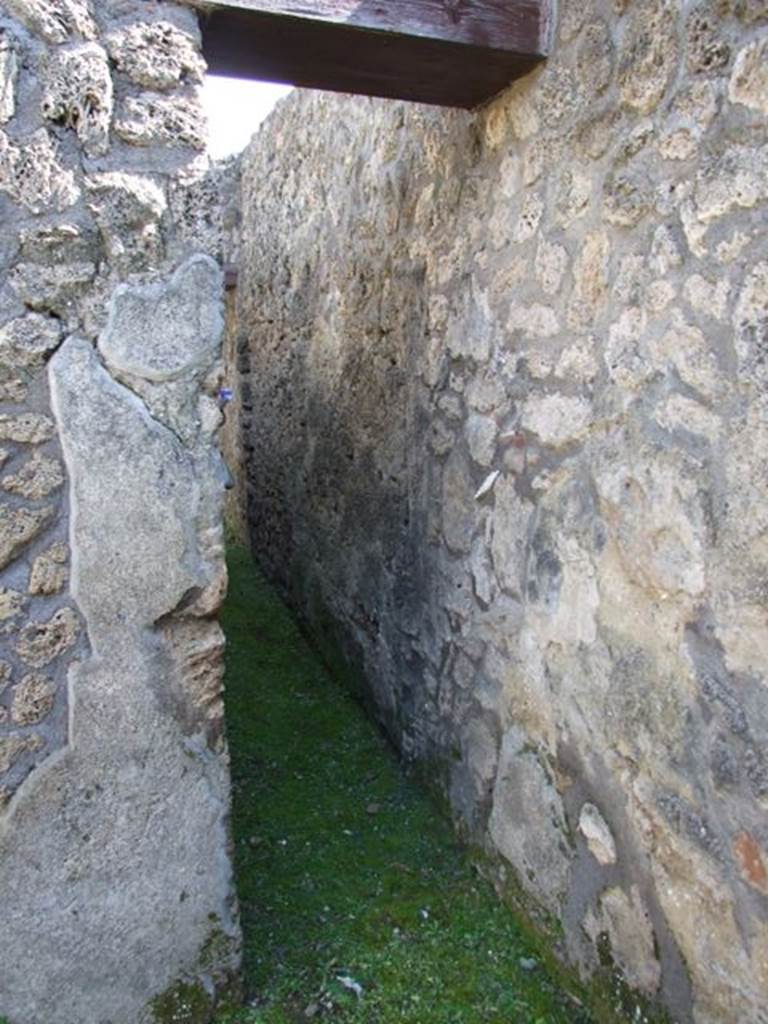 I.13.15 Pompeii. March 2009. Doorway to corridor on east wall, at south end.