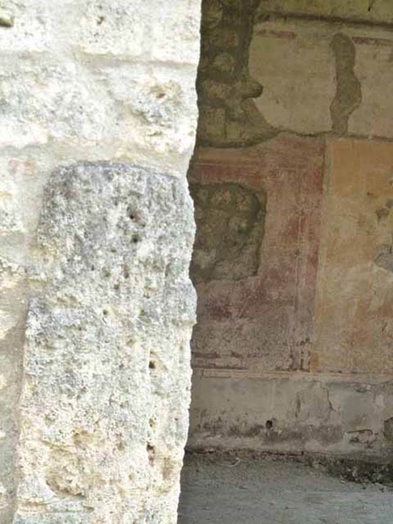 I.14.5 Pompeii. May 2010. Doorway to triclinium, and south wall.