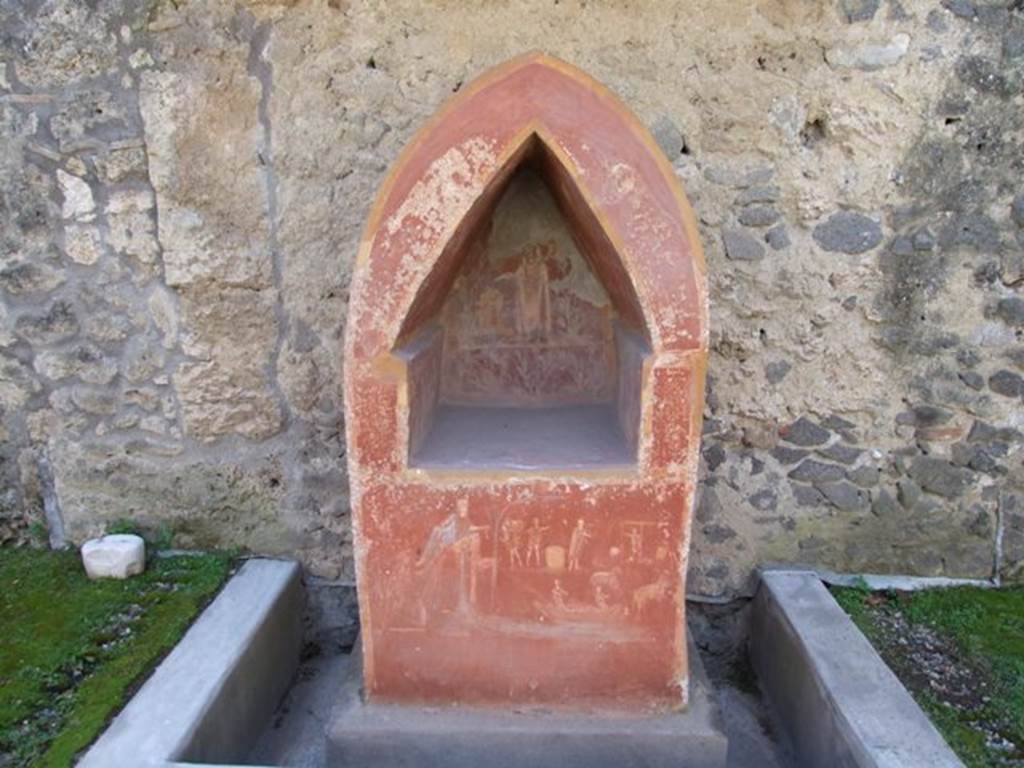 I.14.7 Pompeii. March 2009.
Lararium against south wall of garden area, with water channel around base.
See Fröhlich, T., 1991. Lararien und Fassadenbilder in den Vesuvstädten. Mainz: von Zabern, L33, p. 262-3, Taf. 5,1.