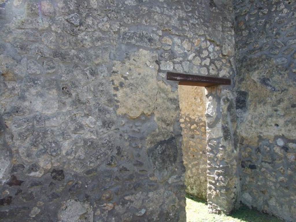 I.14.7 Pompeii. March 2009. Door to windowed triclinium in south west corner of atrium.