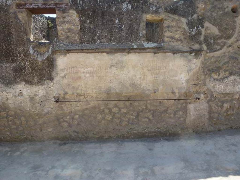I.14.7/8 Pompeii. June 2012. Graffiti on exterior front façade between I.14.7 and I.14.8.
Photo courtesy of Michael Binns.