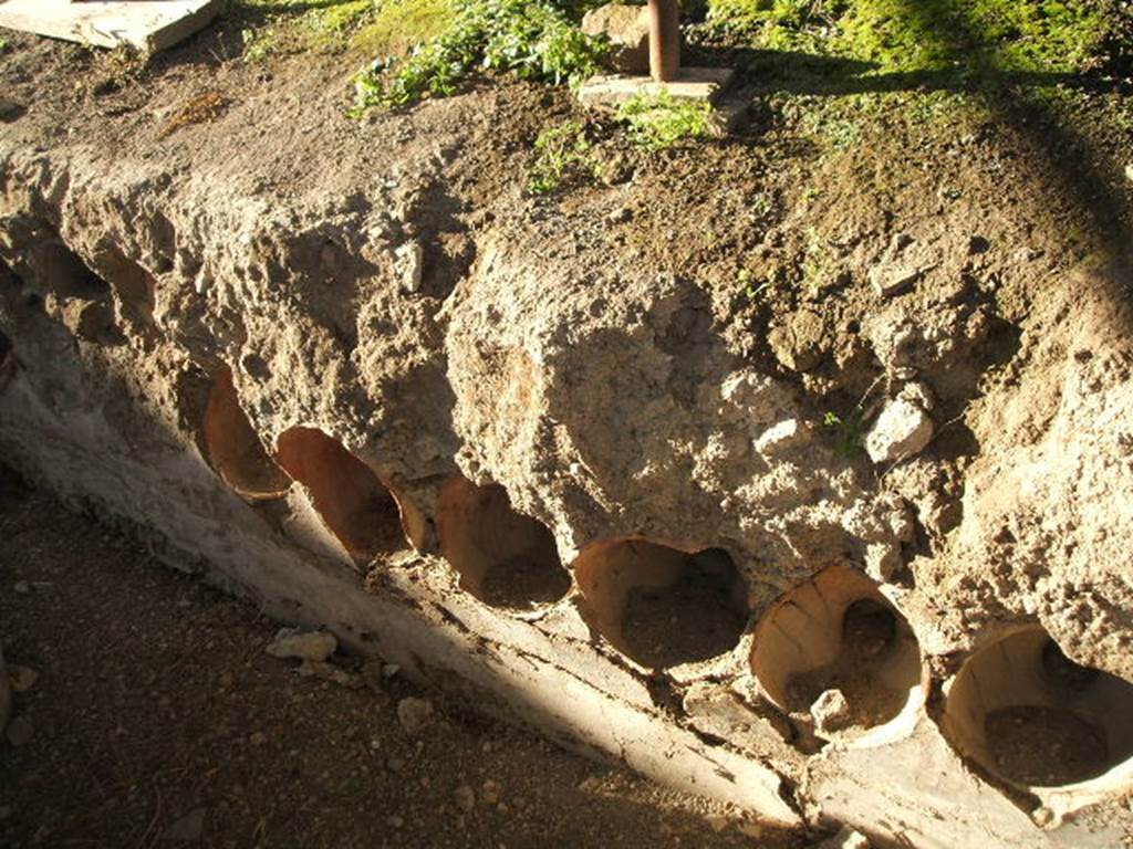 I.14.10 Pompeii. December 2004. Pots in side of Triclinium.