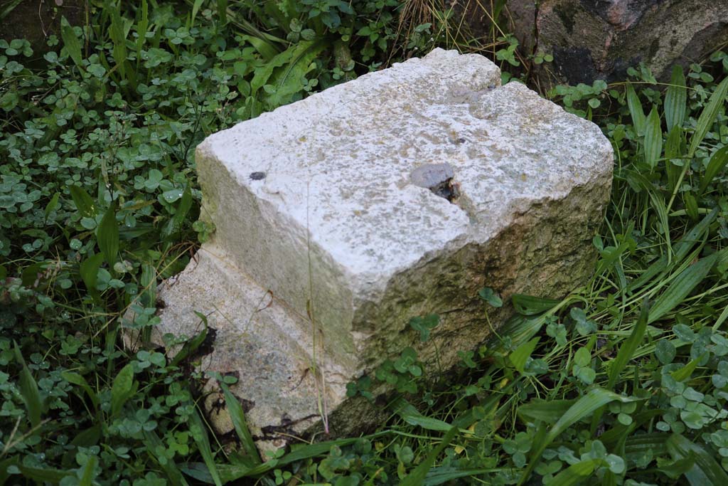 I.14.12, Pompeii. December 2018. Base? of triclinium table. Photo courtesy of Aude Durand.