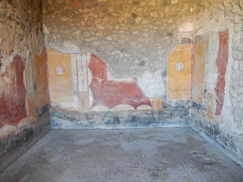I.14.12, Pompeii. May 2018. Room 34, looking towards east wall with medallions at north and south end.
Photo courtesy of Buzz Ferebee.