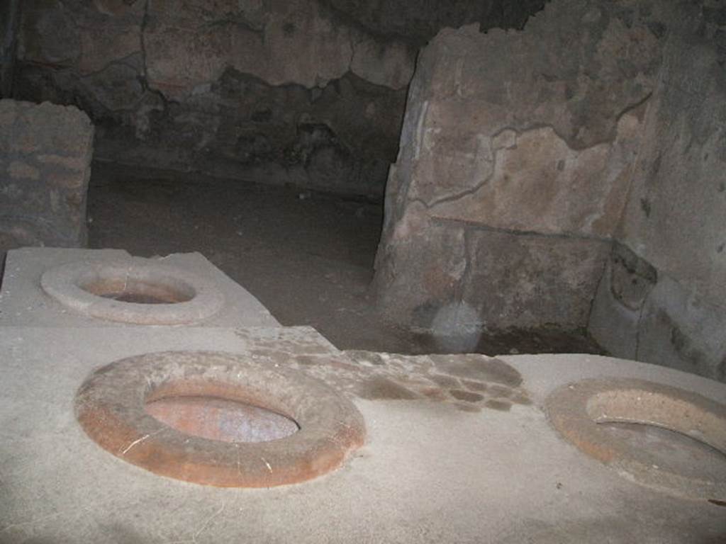 I.14.15 Pompeii. December 2004. Counter with dolia.