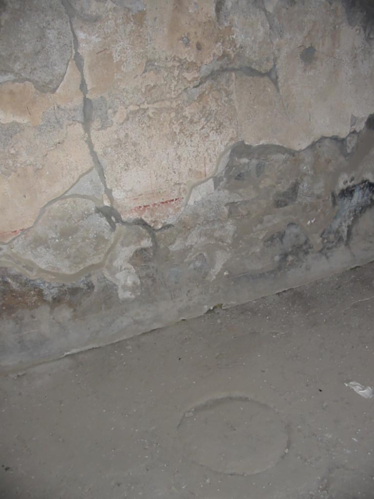 I.14.15 Pompeii. May 2003.
Detail of north wall and floor of rear room behind counter. Photo courtesy of Nicolas Monteix.