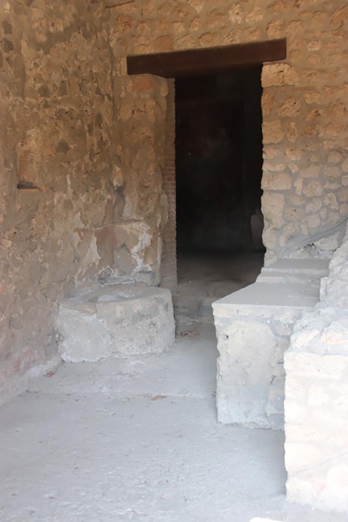 I.14.15 Pompeii. October 2022.
Doorway to rooms on north side of bar-room. Photo courtesy of Klaus Heese.