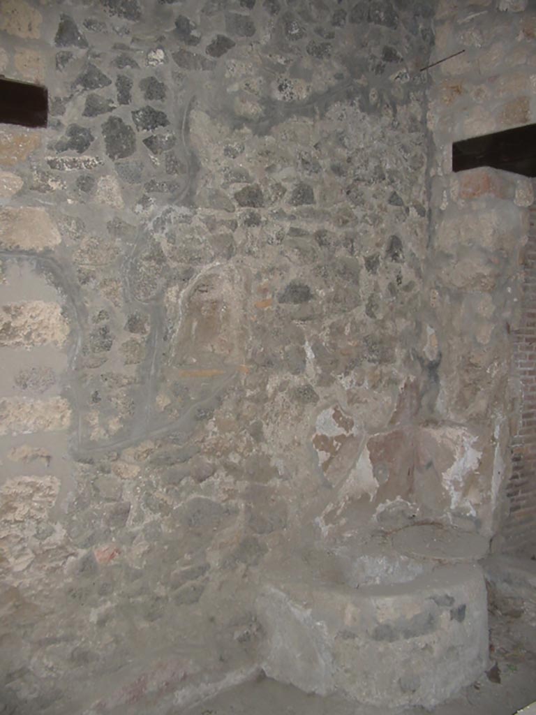 I.14.15 Pompeii. May 2003.
West wall with feature near door to room on north side. Photo courtesy of Nicolas Monteix.