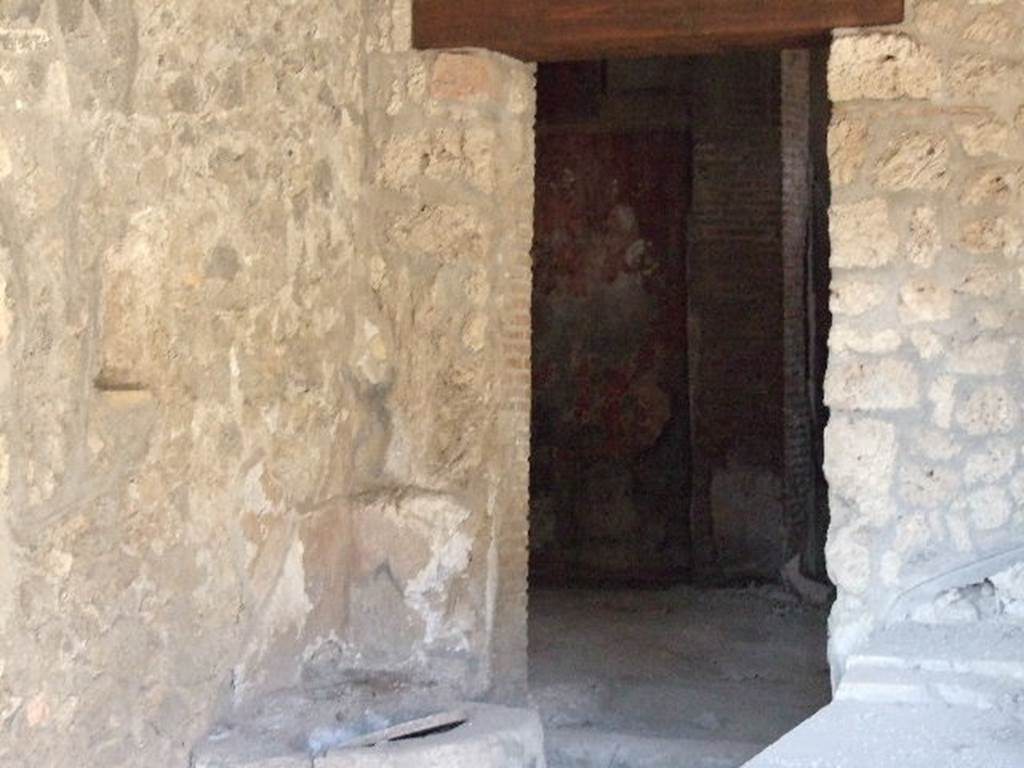 I.14.15 Pompeii. December 2006. Doorway to room on north side of bar.