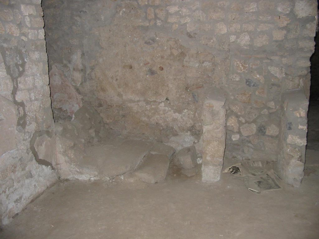 I.14.15 Pompeii. May 2003. South wall of room on north side of bar room.
The doorway to the bar-room is on the right of the picture. Photo courtesy of Nicolas Monteix.
