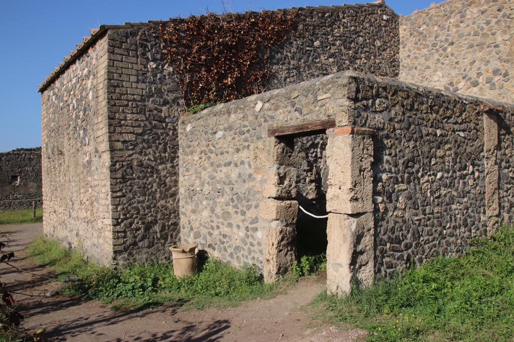 I.15.1 Pompeii. October 2022. Looking north-west towards doorway at rear. Photo courtesy of Klaus Heese.